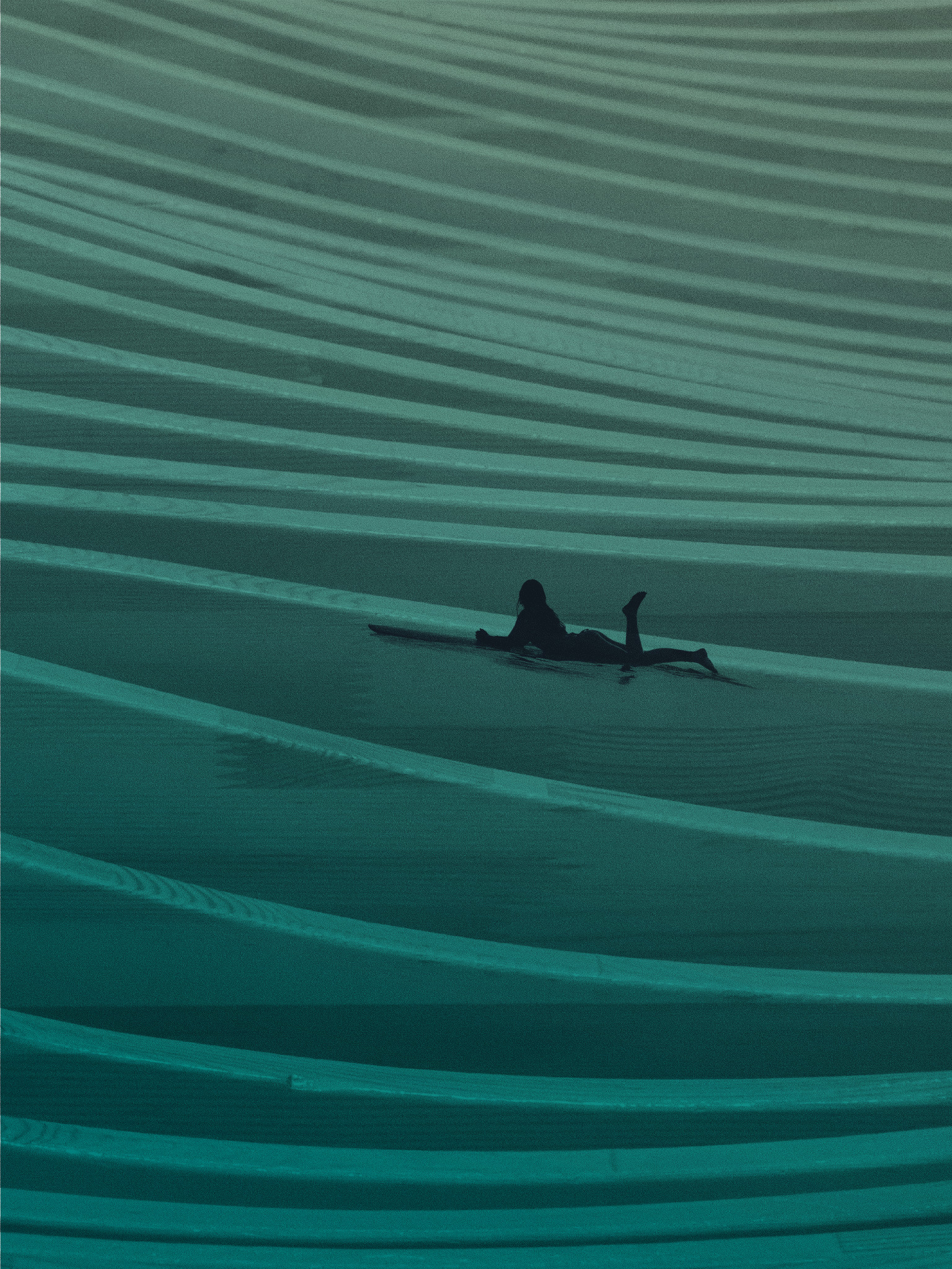 Illustration of surfer on waves.